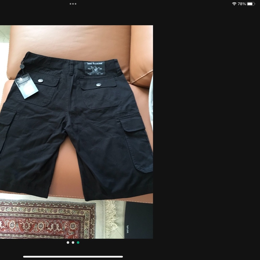 TRUE RELIGION MENS Short ( New) In size 30
New Condition